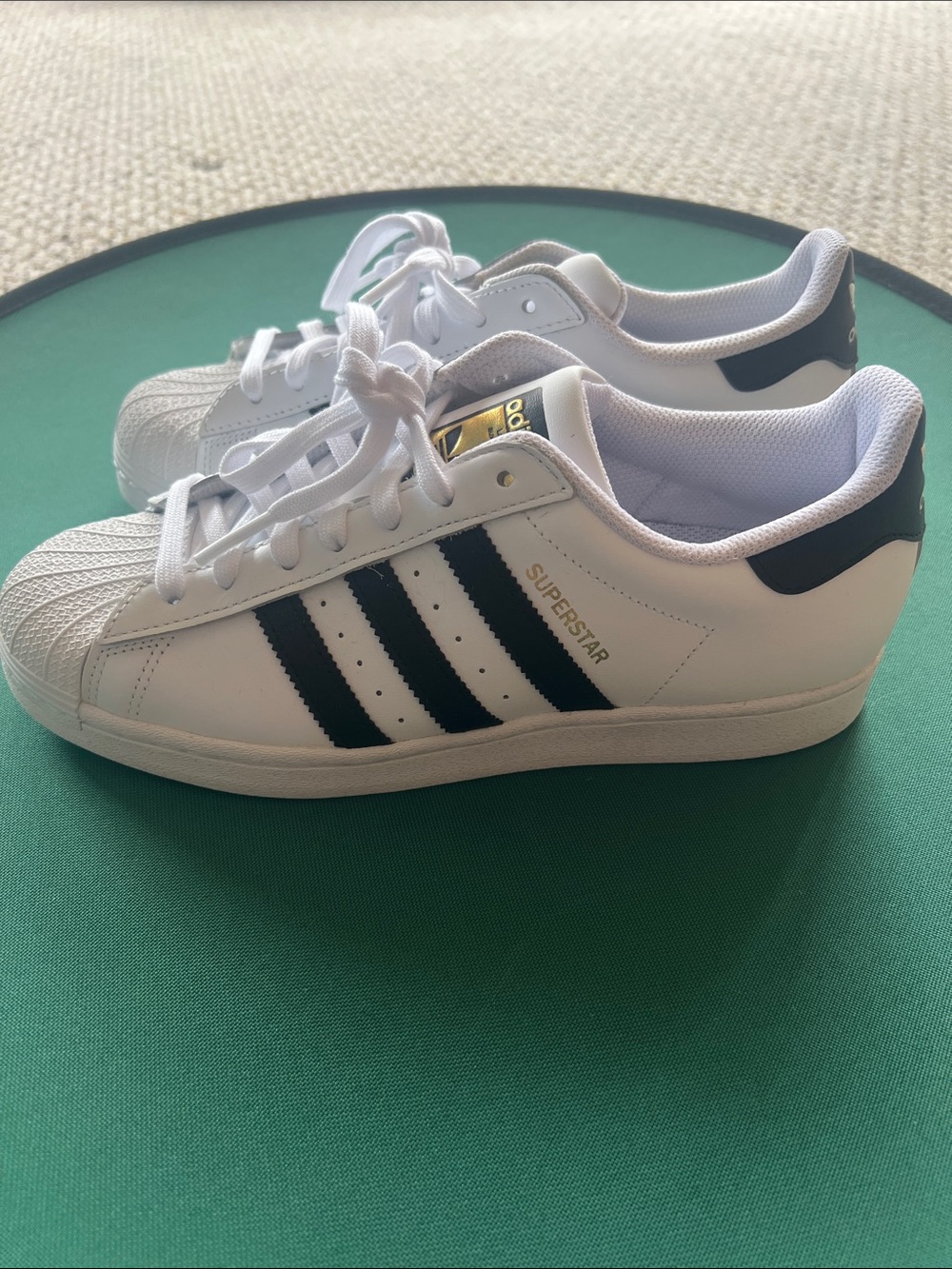 Adidas Men’s Superstar White Sneakers with Black Stripes and Gold Tongue Logo